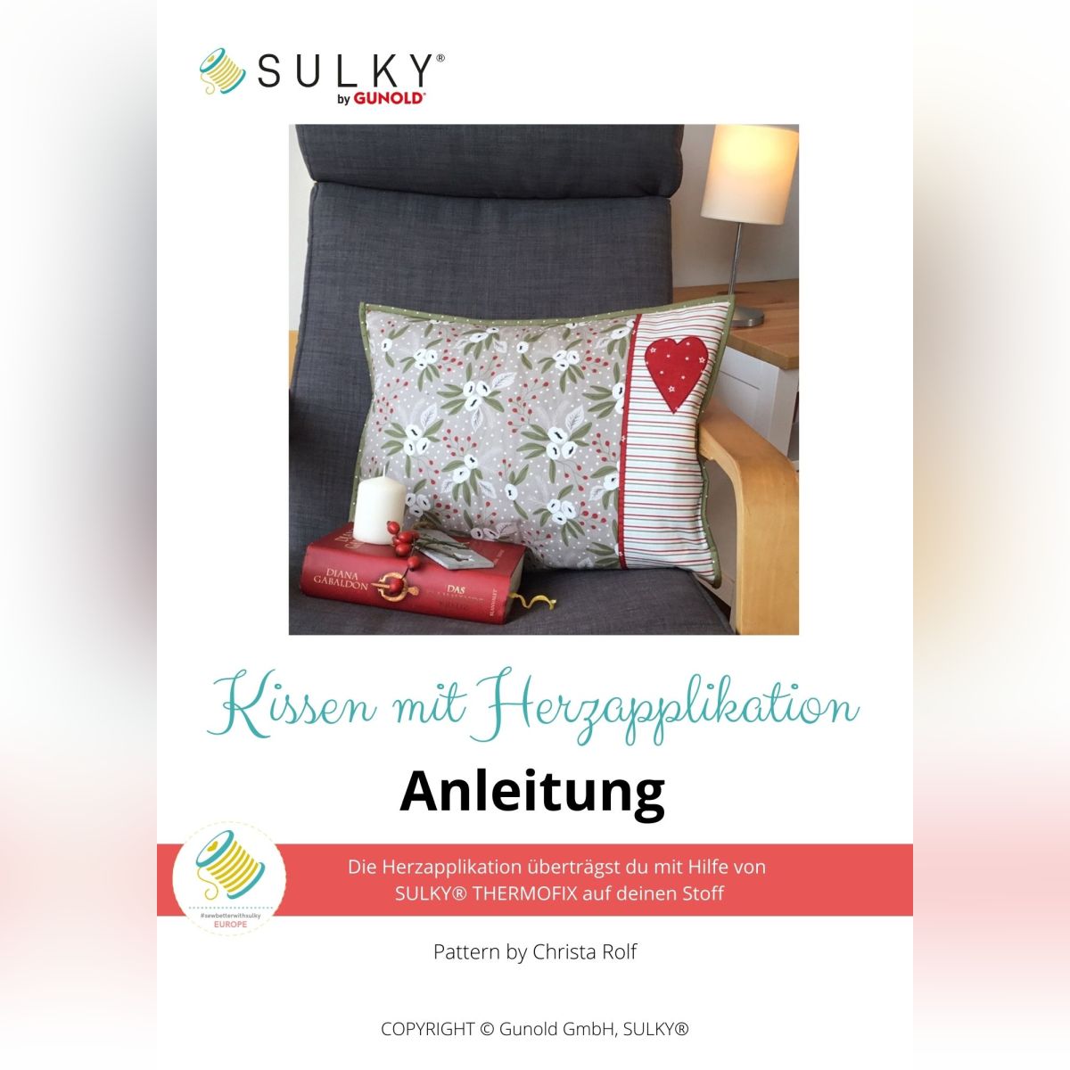 Kissen mit Herzapplikation